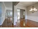 Bright dining room with hardwood floors and chandelier at 12417 Fieldmist Dr, Raleigh, NC 27614