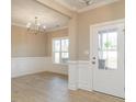 Formal dining room with hardwood floors and wainscoting at 2074 Burch Bridge Rd, Burlington, NC 27217