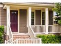 Front entrance with steps, porch and burgundy door at 5437 Overdale Lane Ln, Raleigh, NC 27603