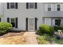 Townhouse exterior with landscaping and walkway at 15 Providence Ct, Durham, NC 27705