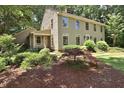 Two story house exterior, light beige siding, large yard at 204 Candlewood Rd, Rocky Mount, NC 27804