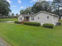 House with a gray exterior and a large front yard at 5009 C And L Ave, Wake Forest, NC 27587