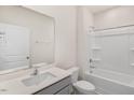 Clean bathroom with tub, shower, and vanity at 1736 Post Oak Dr, Haw River, NC 27258