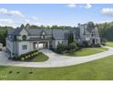 Luxury home with circular driveway and attached garage at 12660 Boyce Milll Road, Raleigh, NC 27613