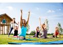 Outdoor yoga class in a beautiful community park at 201 Big Bradley Dr, Wendell, NC 27591