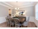 Elegant dining room featuring a large table, chandelier, and hardwood floors at 173 Ascot, Rocky Mount, NC 27804