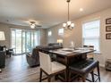 Bright dining area with sliding glass doors leading to patio at 1308 Holly Blue, Fuquay Varina, NC 27526