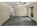 Well-lit bedroom featuring gray carpeting at 1517 Wiljohn Rd, Garner, NC 27529