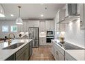 Modern kitchen with stainless steel appliances and an island at 11 Claude Creek Dr, Smithfield, NC 27577