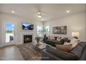 Spacious living room with fireplace and access to backyard at 11 Claude Creek Dr, Smithfield, NC 27577