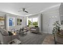 Living room with hardwood floors and neutral furniture at 1102 N Guthrie Ave, Durham, NC 27703
