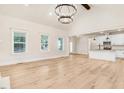 Open concept living area with hardwood floors and a fireplace at 4155 Us-421, Lillington, NC 27546