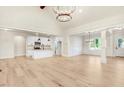 Open concept living space with hardwood floors and a large chandelier at 4155 Us-421, Lillington, NC 27546