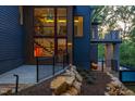 Modern home exterior with a deck and infinity pool at 23930 Cherry, Chapel Hill, NC 27517