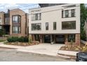 Modern two-unit building with attractive brick exterior and attached garages at 515 W Lenoir St # 101, Raleigh, NC 27601