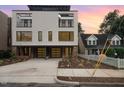 Modern two-unit building with sleek design and double garages at 515 W Lenoir St # 102, Raleigh, NC 27601