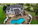 Luxury home with pool, deck, and extensive backyard at 4600 Scottland Dr, Mebane, NC 27302