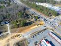 Aerial view of road construction near a commercial area at 1229 Tulip St, Clayton, NC 27520