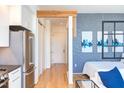 Modern kitchen with stainless steel appliances and white cabinets at 515 N Mangum St # 51, Durham, NC 27701