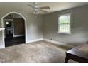 Spacious living area with hardwood floors and large windows at 511 Usher St, Durham, NC 27704