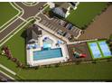 Aerial view of community pool, playground, and pickleball courts at 27 Pansy Park # 230, Clayton, NC 27520