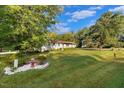 House with a large front yard and fire hydrant at 2063 Knight St, Creedmoor, NC 27522