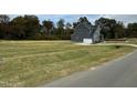 Two story home with gray siding and attached garage at 230 Grading Stick Ct, Angier, NC 27501