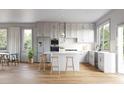 Modern kitchen with white shaker cabinets and island at 202 Byrum St # 2, Cary, NC 27511