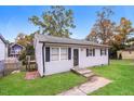 Single story home with front yard and walkway at 2825 S Roxboro St, Durham, NC 27707