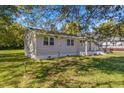 Side view of newly renovated home with green lawn at 712 Blount St, Smithfield, NC 27577