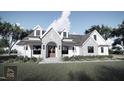 Modern farmhouse exterior with white siding at Lot 5 Joyful Creek Trl, Zebulon, NC 27597