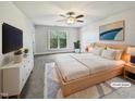 Main bedroom with large window and neutral decor at 2504 Timothy Dr, Fuquay Varina, NC 27526