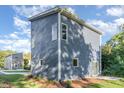Modern home with gray siding and large windows at 112 N Guthrie Ave # B, Durham, NC 27703