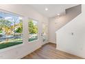 Bright entryway with hardwood floors and stairs at 112 N Guthrie Ave, Durham, NC 27703