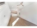 Open living room with hardwood floors and kitchen island at 112 N Guthrie Ave, Durham, NC 27703