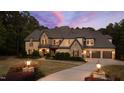 Luxury home exterior view at dusk at 2117 Blue Haven Ct, Wake Forest, NC 27587
