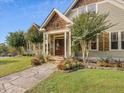 Front entry with stone accents and landscaping at 548 Double N Rd, Pittsboro, NC 27312