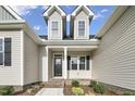 House exterior with dormer windows and front porch at 45 S Harper Faith Way, Benson, NC 27504