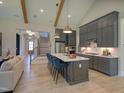 Modern kitchen with island and stainless steel appliances at 1565 Bowers Store Rd, Siler City, NC 27344