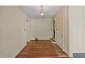 Hardwood floors, neutral walls, and a view of the living room from entry at 2445 Pineway Dr, Burlington, NC 27215