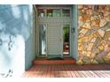 Inviting front entrance with stone and wood accents at 403 Rutherglen Dr, Cary, NC 27511