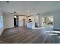 Open concept kitchen with island and stainless steel appliances at 2710 - A Mansfield Ave, Durham, NC 27703