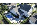 Luxury home with pool, patio, and screened porch, perfect for entertaining at 117 Hardy Oaks Way, Holly Springs, NC 27540