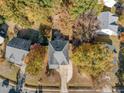 Aerial view of a house with driveway and backyard at 1608 Irving Place, Creedmoor, NC 27522