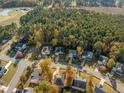 Aerial view of houses in a quiet residential neighborhood at 1608 Irving Place, Creedmoor, NC 27522