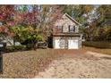Two-story house with stone and siding exterior at 1412 Hanford Hills Rd, Graham, NC 27253