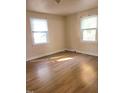 Well-lit bedroom with light wood flooring at 327 Ranch Farm Rd, Raleigh, NC 27603