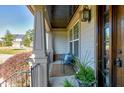 Inviting front porch with seating area and landscaping at 5356 Cypress Ln, Raleigh, NC 27609