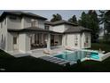 Luxury home with a pool and spacious patio area at 211 Reynolds Rd, Raleigh, NC 27609