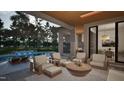 Relaxing patio with lounge furniture and pool views at 211 Reynolds Rd, Raleigh, NC 27609